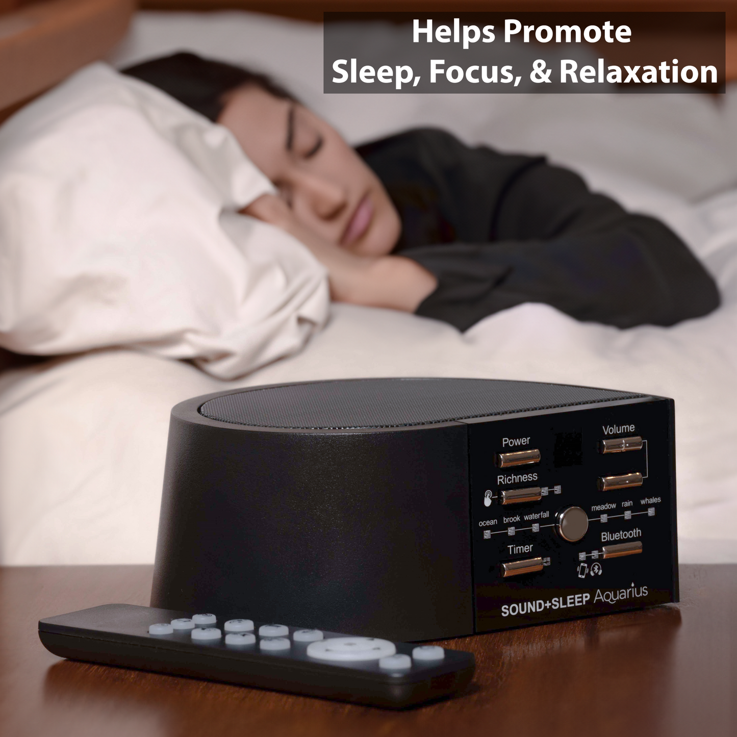 Sound+Sleep Aquarius Bluetooth Speaker and Water Sound Sleep Machine on Bedside Table Infront of Woman Sleeping